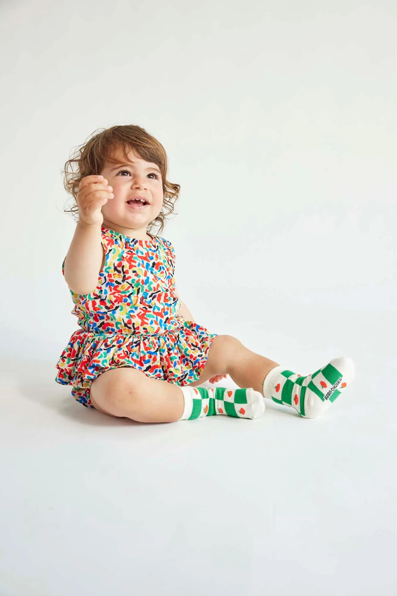 Confetti All Over Ruffle Woven Baby Romper