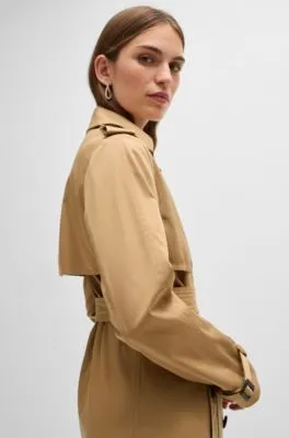 Double-breasted trench coat with buckled belt